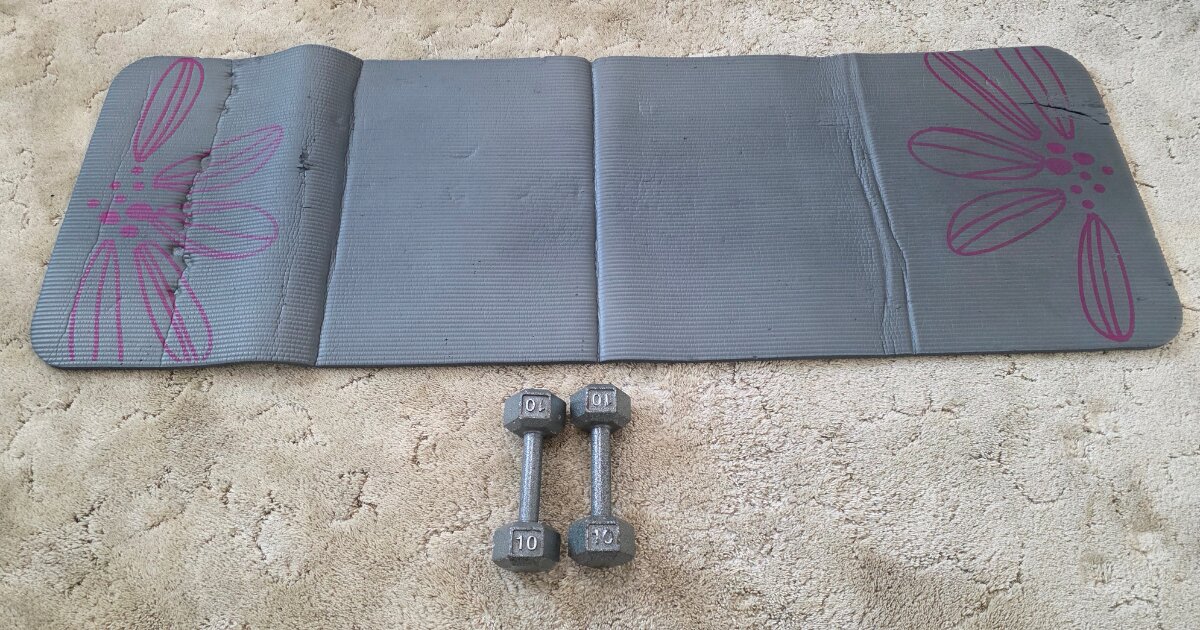 exercise mat and dumbbells